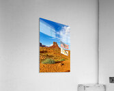 Monument Valley displays flags under blue sky in USA Acrylic Print