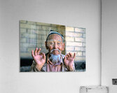 Elderly man showing hand gestures in Khiva Uzbekistan Acrylic Print