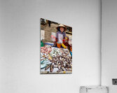 Fish seller in Phu Quoc market shows fresh catch for sale Acrylic Print