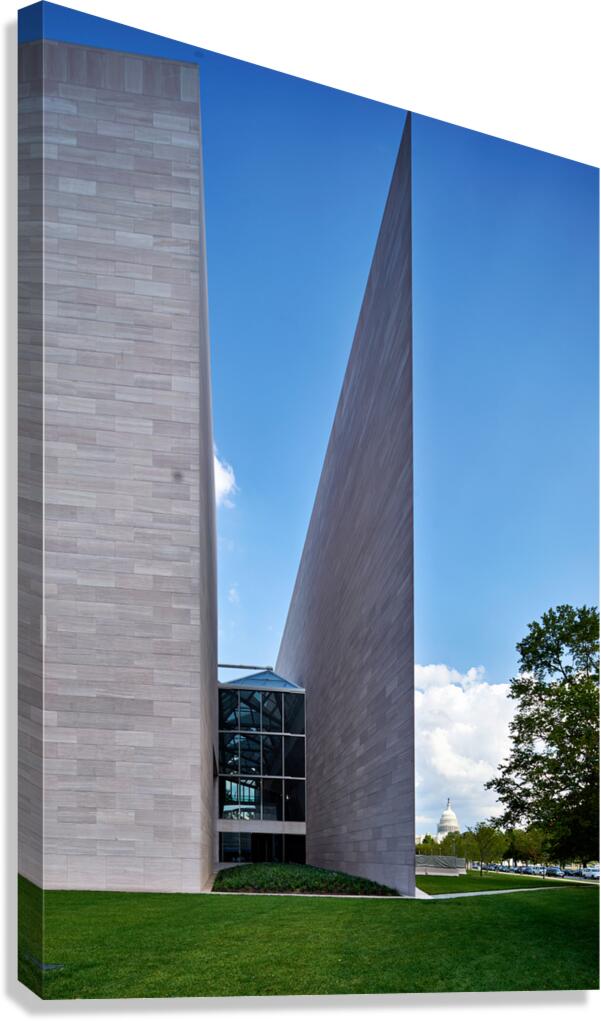 The East Building of the National Gallery of Art. In the background the United States Capitol. Washington D.C.