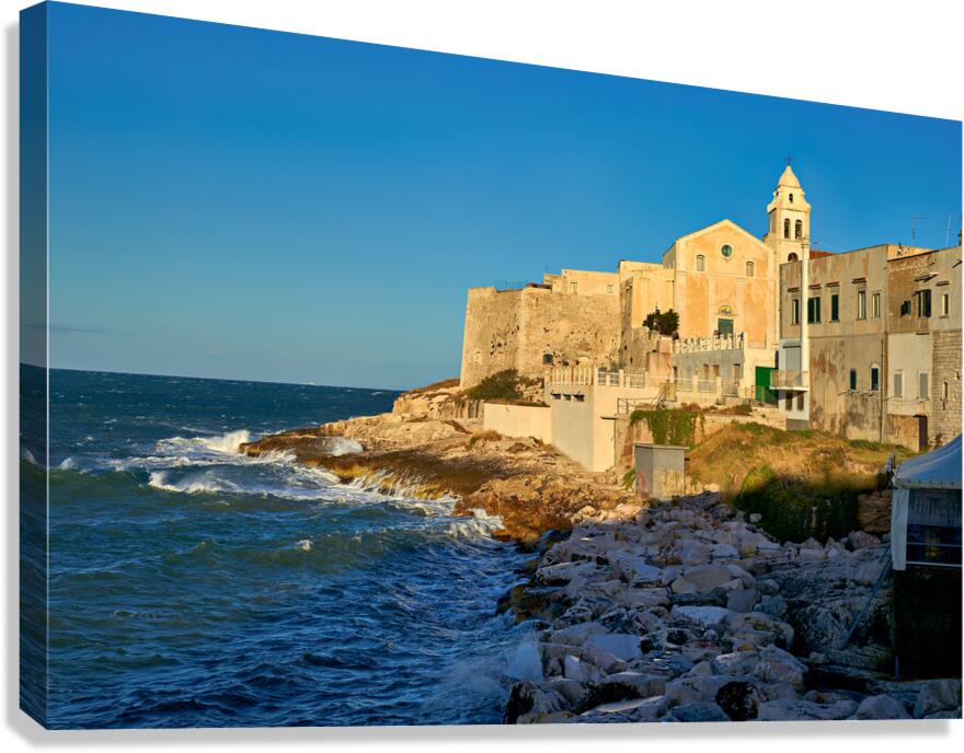 Vieste Gargano. Apulia Puglia Italy. Cape San Francesco and San Francesco church at dusk