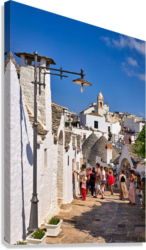Apulia Puglia Italy. Alberobello. Trulli: traditional Apulian dry stone huts with a conical roof.