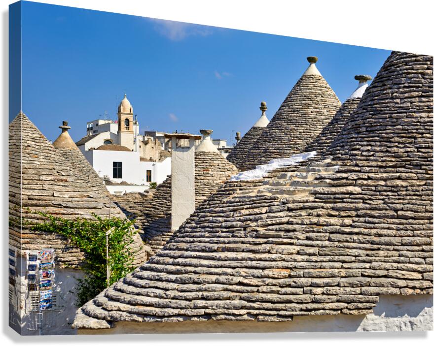 Apulia Puglia Italy. Alberobello. Trulli: traditional Apulian dry stone huts with a conical roof.