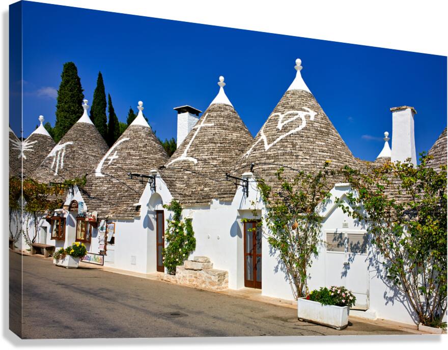 Apulia Puglia Italy. Alberobello. Trulli: traditional Apulian dry stone huts with a conical roof.
