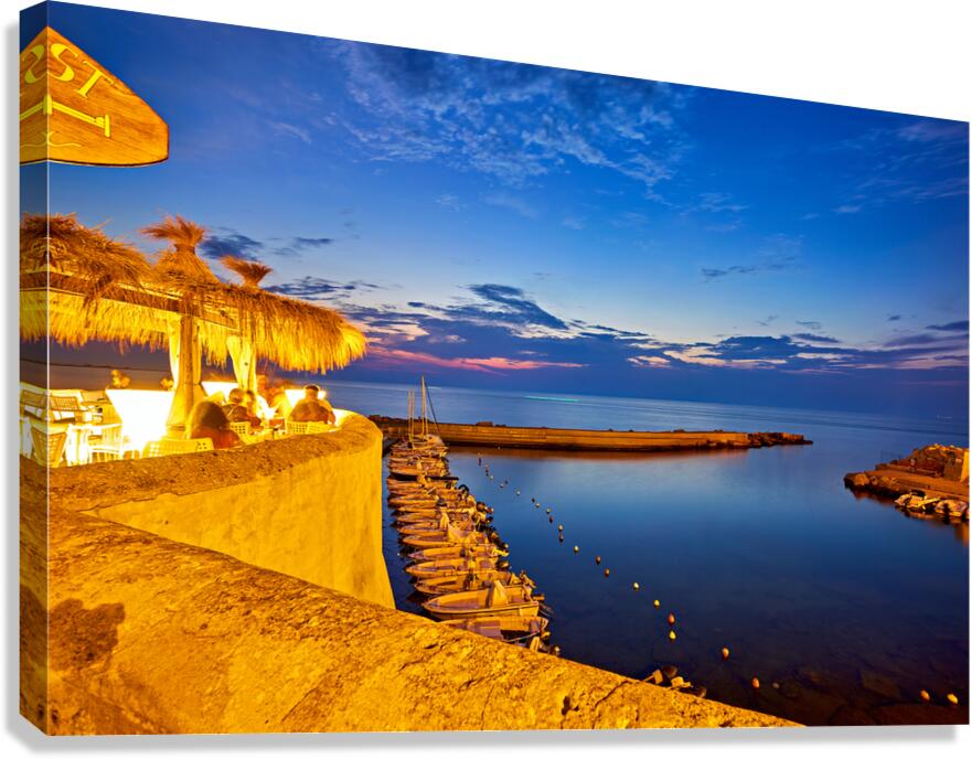 Salento. Apulia Puglia Italy. Gallipoli. Aperitif on the waterfront at sunset.