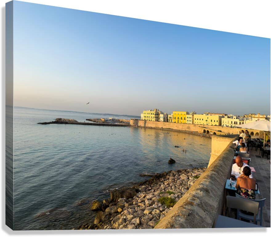 Gallipoli Puglia Salento Italy. Aperitif ay sunset at the town walls