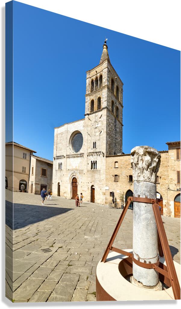 Bevagna Umbria Italy. San Michele Arcangelo church and roman column in San Silvestro square