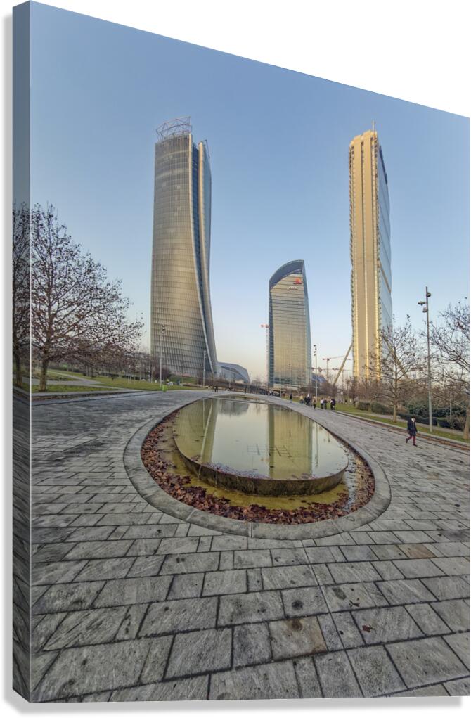 Milan Italy. Modern skyscrapers and reflective pond in a city pa