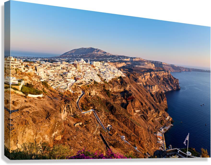Santorinis iconic white village on caldera cliffs Aegean Sea.