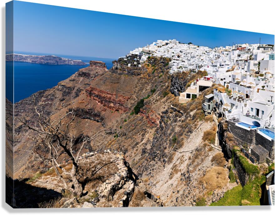 Santorini: White cliffside village and caldera view.