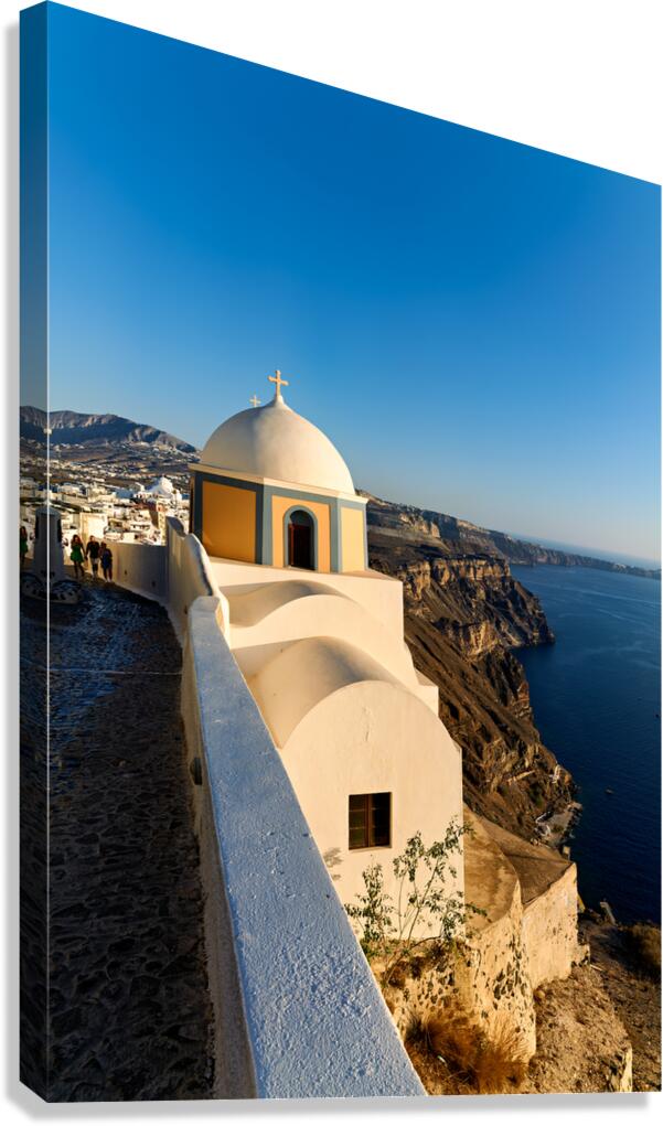 Iconic Santorini church with caldera view.