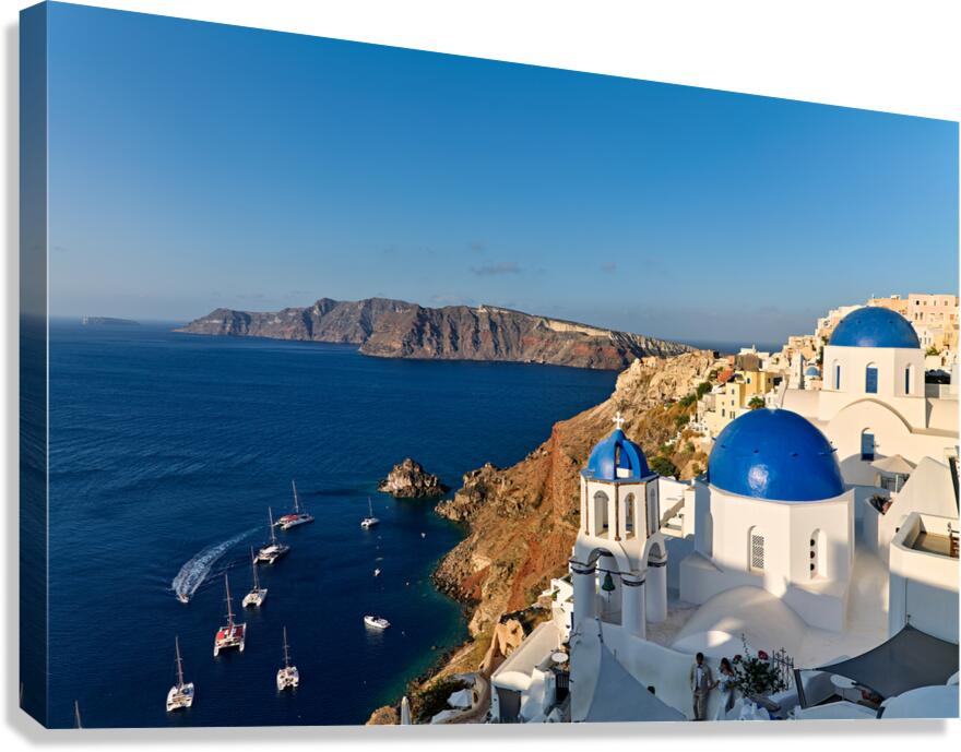 Stunning Santorini vista: blue domes white village caldera bo