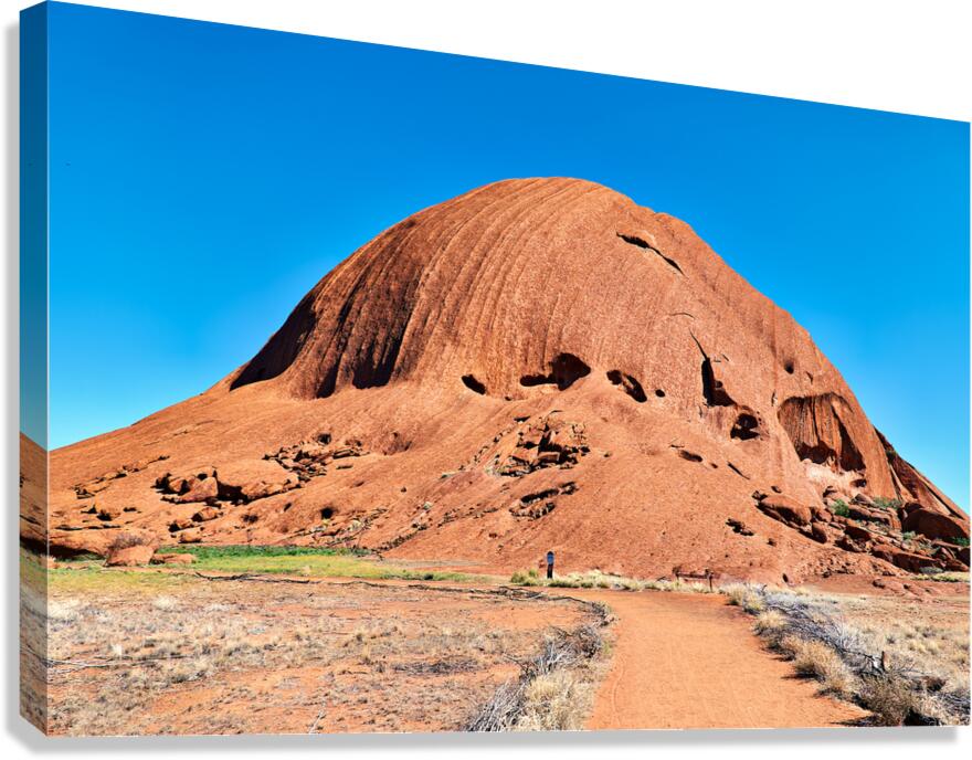 Uluru Australias iconic sandstone monolith under a clear blue