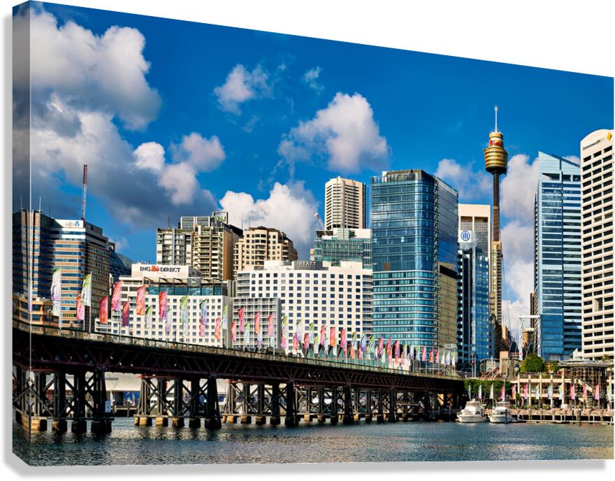 Sydney Harbour skyline with bridge and boats.