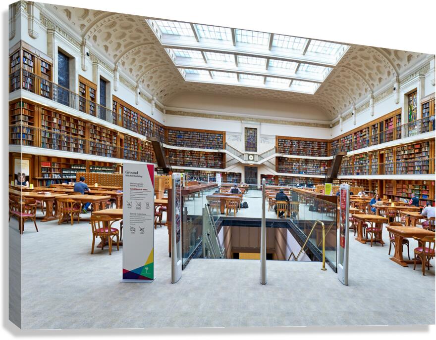 Spacious library with ornate ceiling books and people studying