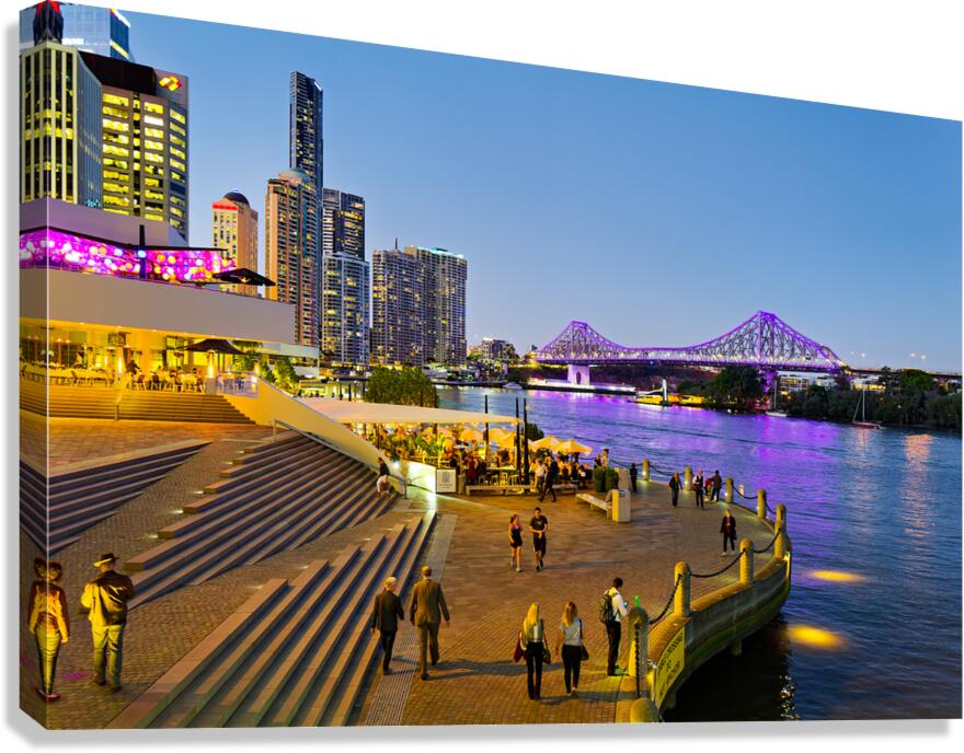 Brisbanes Story Bridge and riverfront promenade bustling at nig