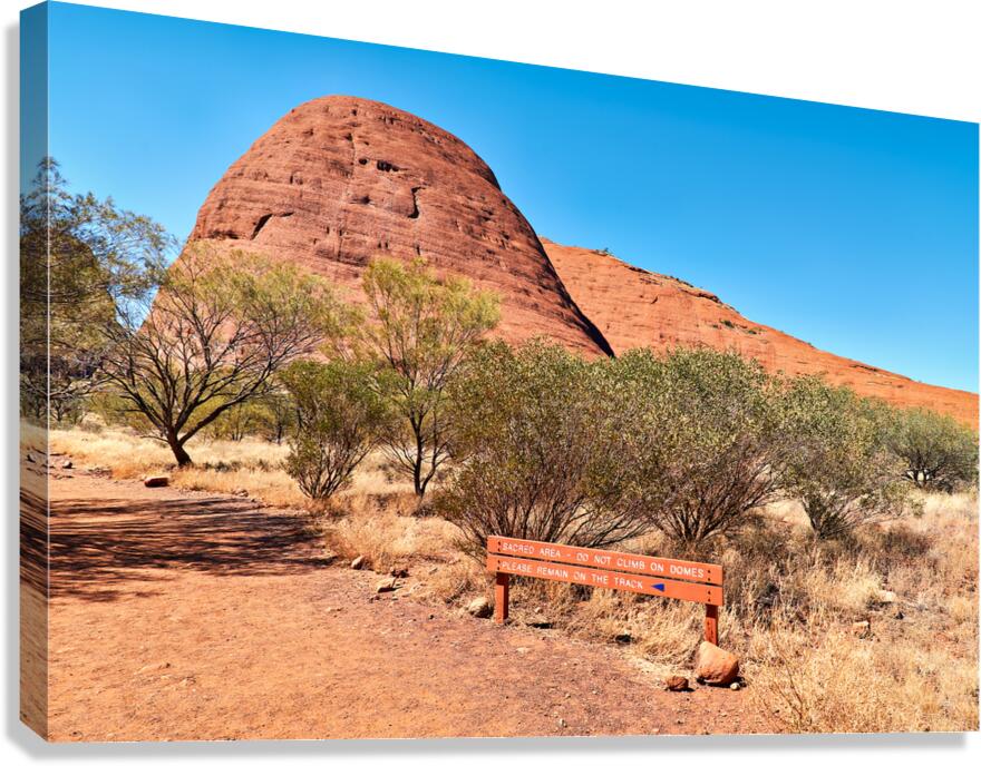 Sacred area sign in front of Kata Tjuta domes Australia.