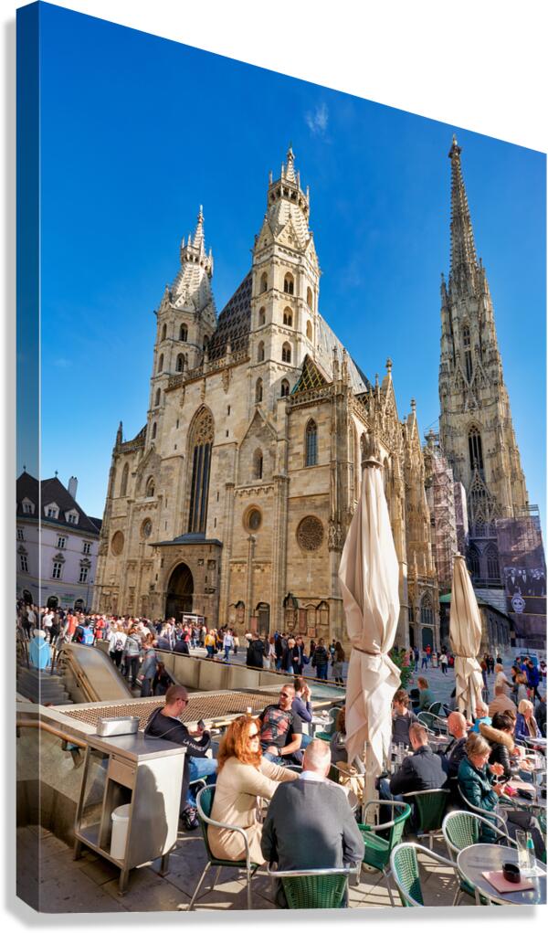 St. Stephens Cathedral Vienna bustling with people and cafes.
