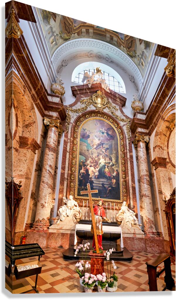Baroque church interior altar painting and saint statue.