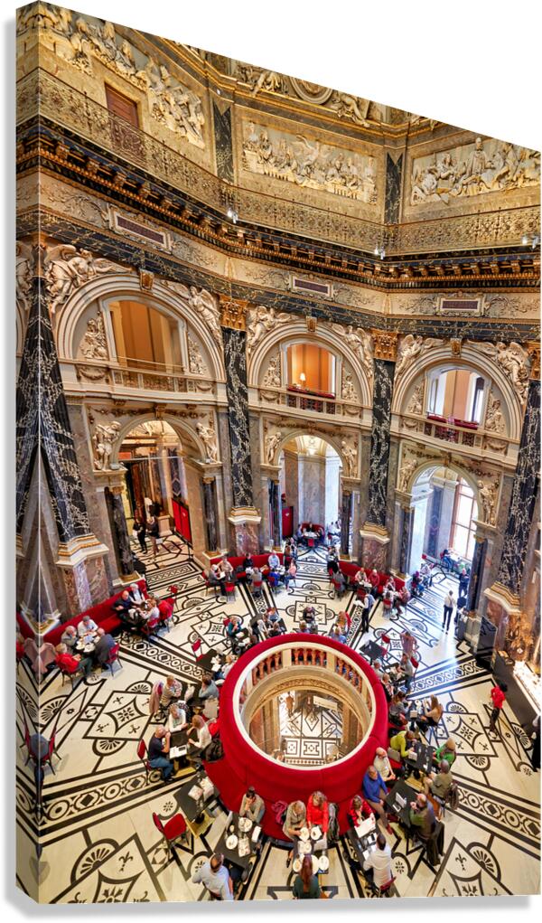 Ornate museum cafe bustling with visitors.