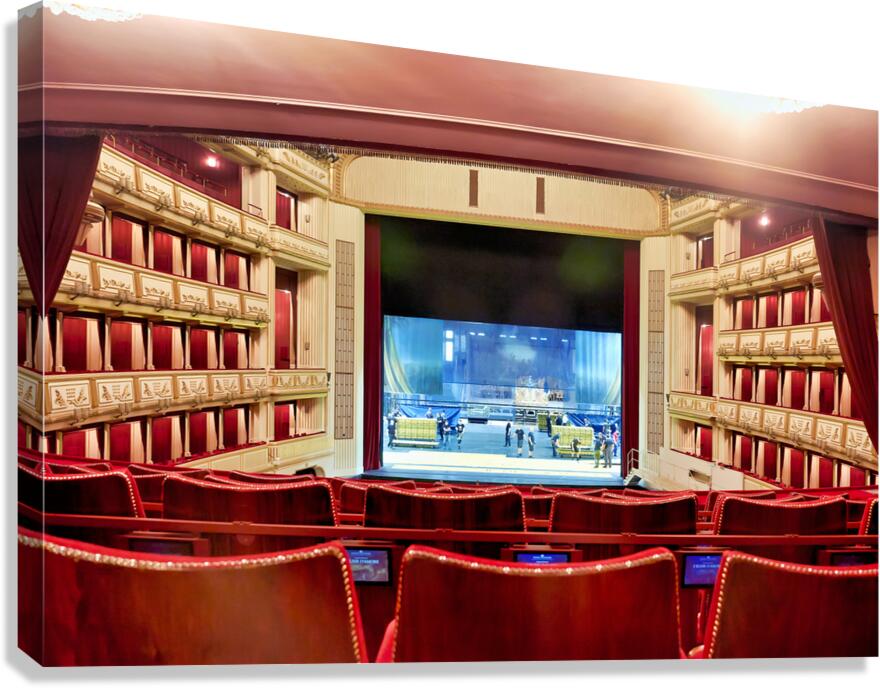 Grand opera house interior with stage crew working.