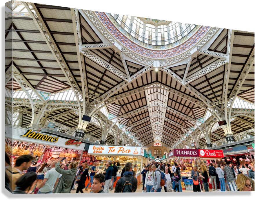 Visitors explore stalls in Central Market of Valencia Spain