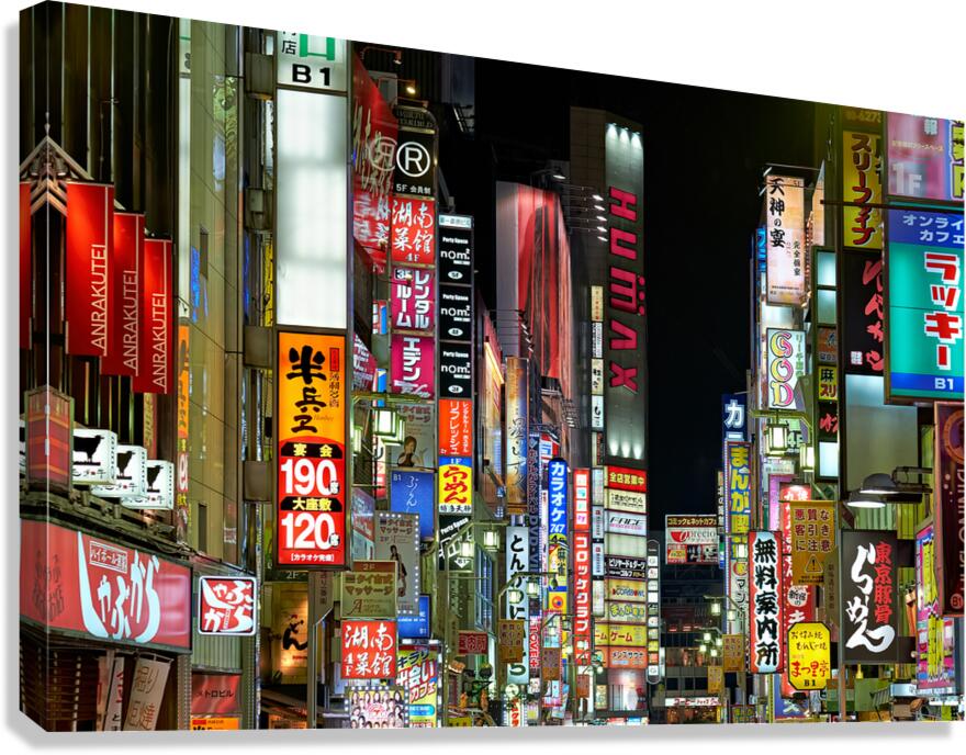 Neon lights shining in Shinjuku district of Tokyo during nightti