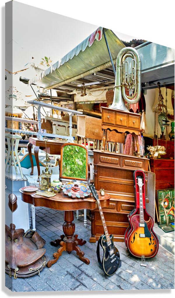 Flea market in Monastiraki Athens with various antiques and ite