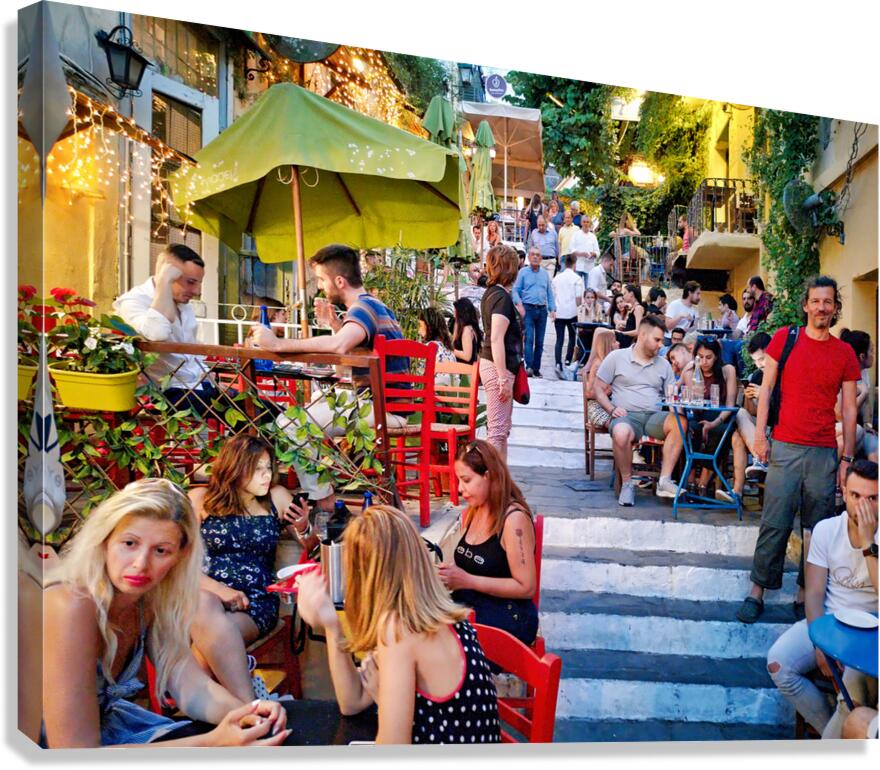Dining and socializing in a crowded outdoor cafe in a city