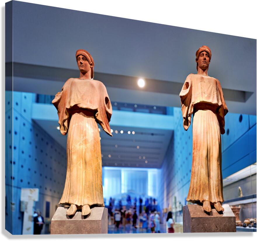 Visitors explore the Acropolis Museum in Athens while viewing st