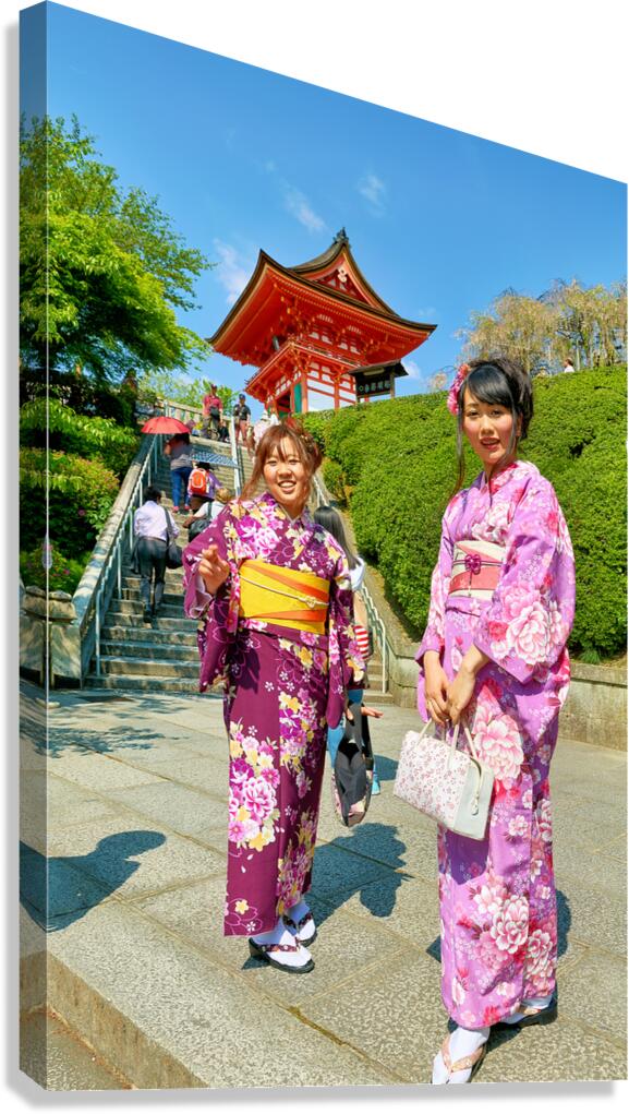 Young women in kimono visit Kiyomizu Dera Temple in Kyoto Japan