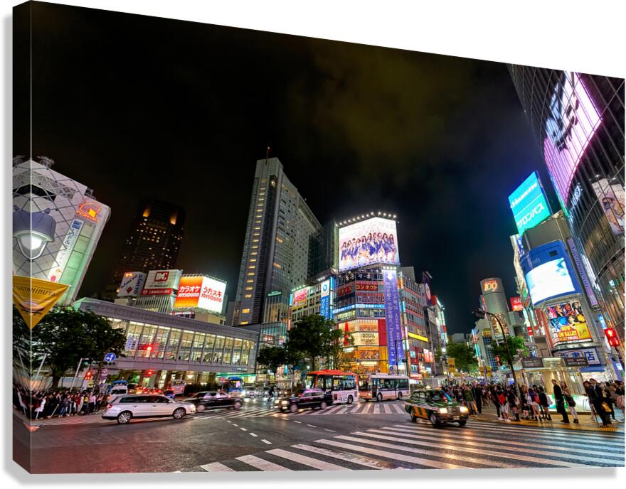Shibuya Tokyo: vibrant night lights and bustling traffic