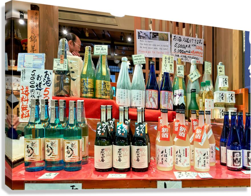 Sake bottles displayed at Nishiki Market in Kyoto Japan