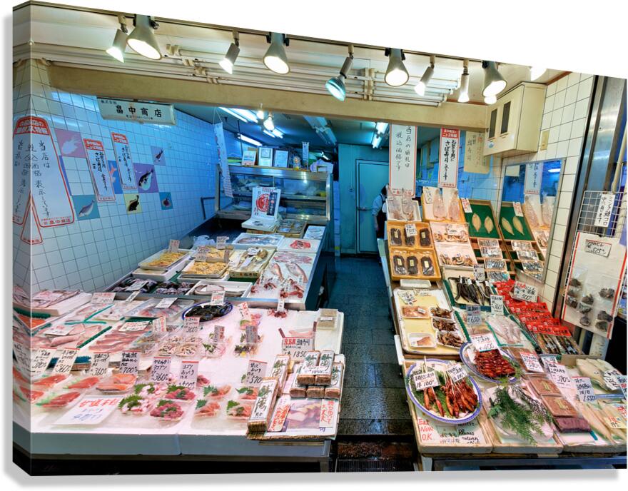 Nishiki Market fishmonger sells fresh seafood in Kyoto Japan
