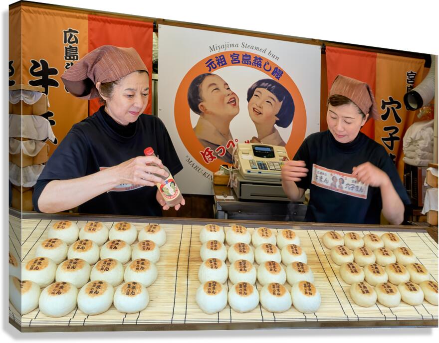 Steam buns are made by women in Miyajima Hiroshima Japan