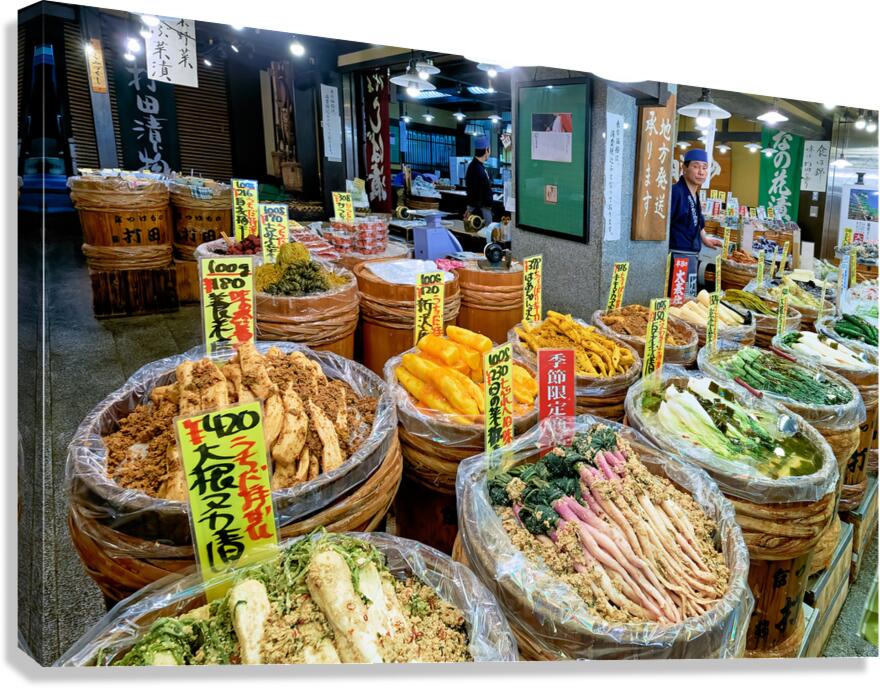 Nishiki Market in Kyoto shows local food vendors selling vegetab