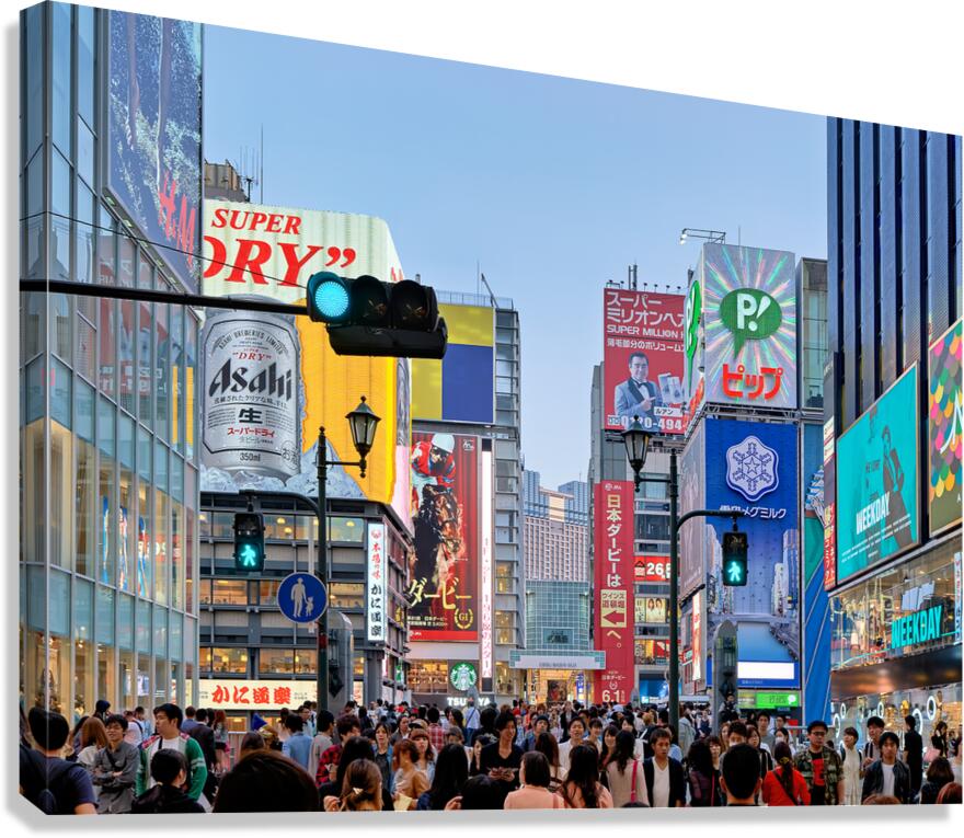 Signboards in Dotonbori District draw crowds during sunset in Os