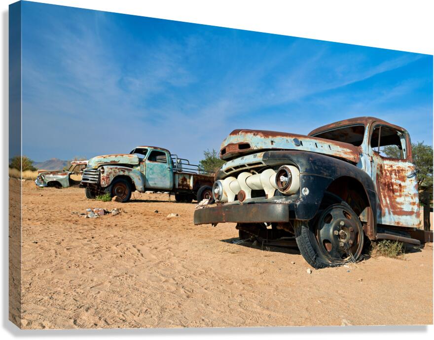Classic cars wrecks decay in Namibia desert countryside