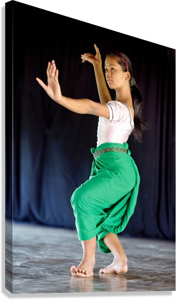 Young girl performing traditional dance.