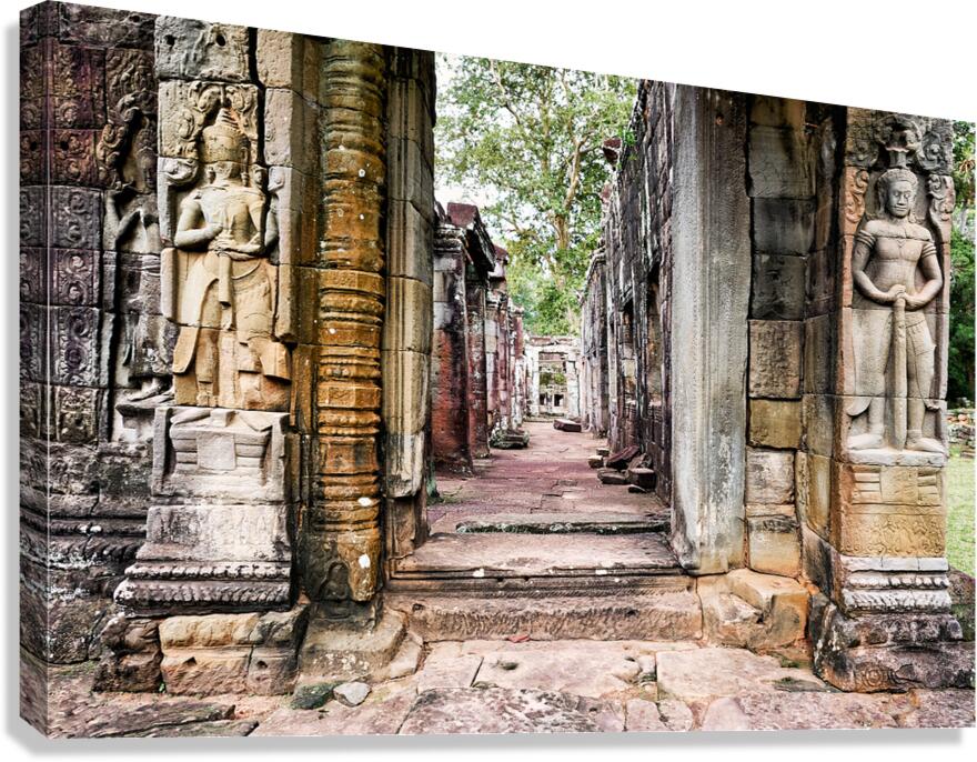 Ancient stone temple ruins with carved figures.