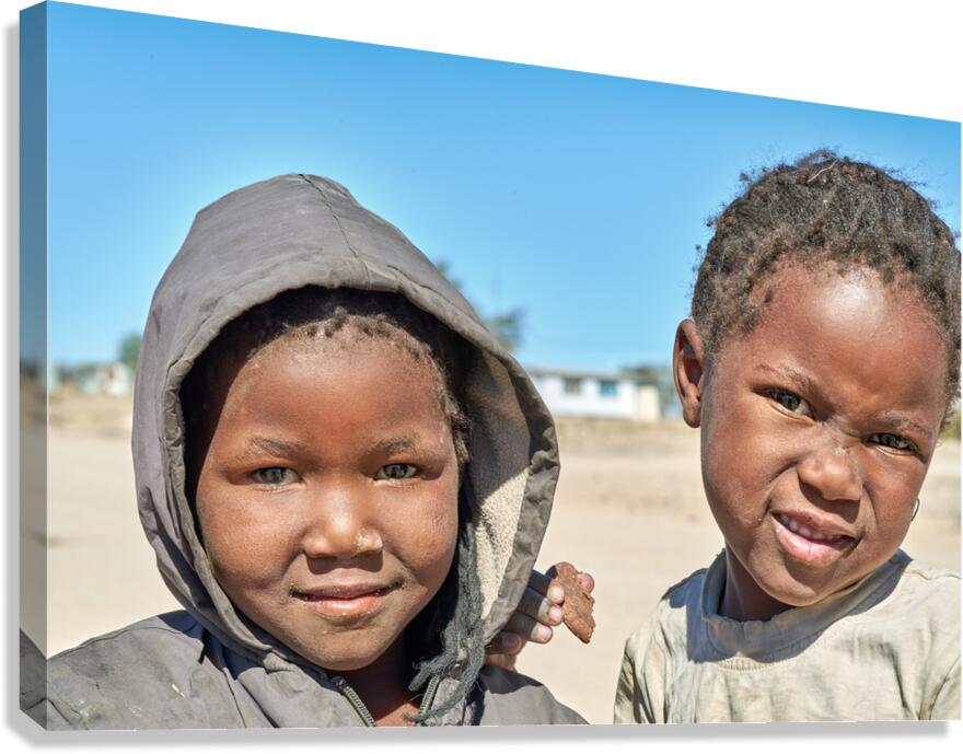Children in Damaraland village of Namibia share a moment togethe