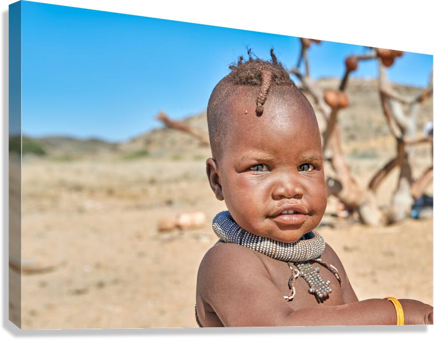 Portrait of Himba child in Kunene region of Namibia