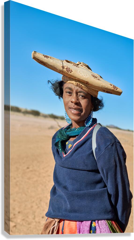 Woman of Herero Bantu ethnic group in Namibias landscape