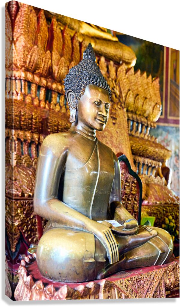 Golden Buddha statue in a temple.