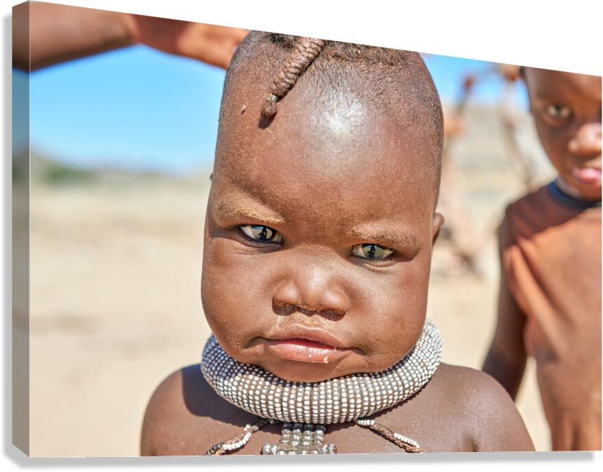 Portrait of Himba child in Kunene region of Namibia