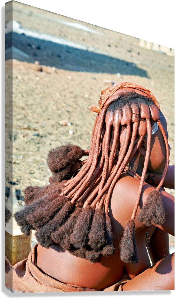 Traditional hair headdress worn by woman in Himba village in Nam