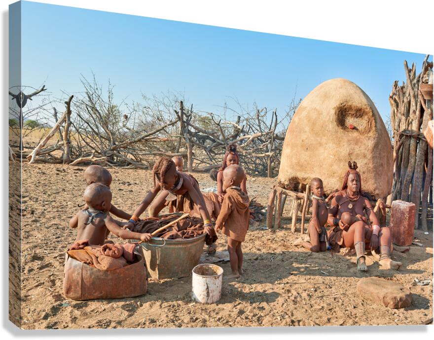Family activities in Himba village in Kunene Region of Namibia