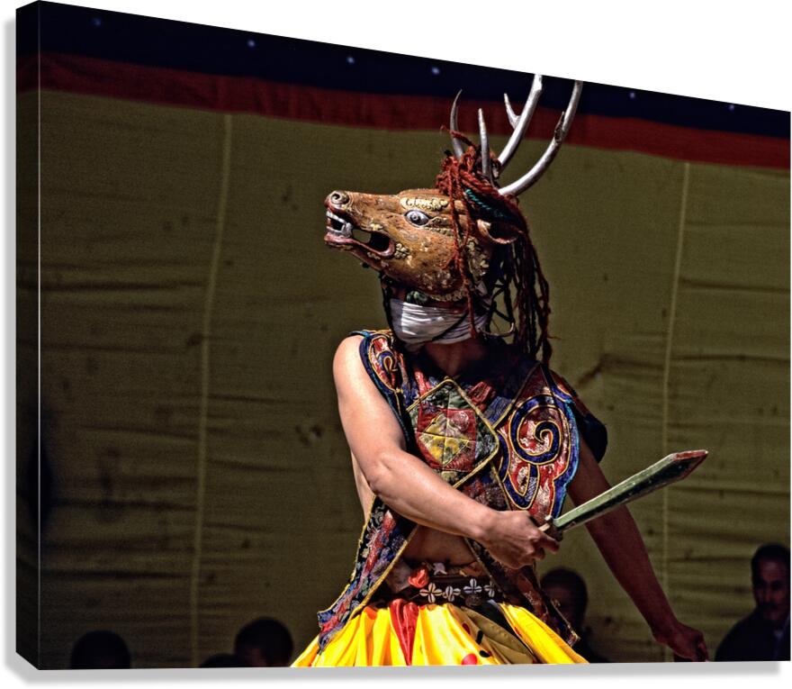 Traditional deer mask dancer with sword.
