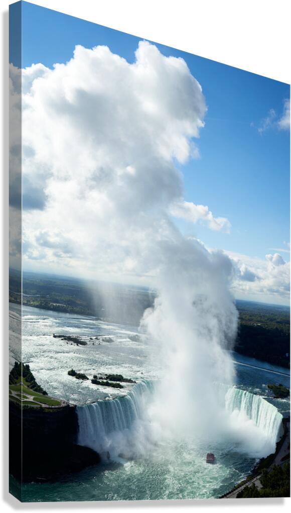 Majestic Niagara Falls boat in mist blue sky.