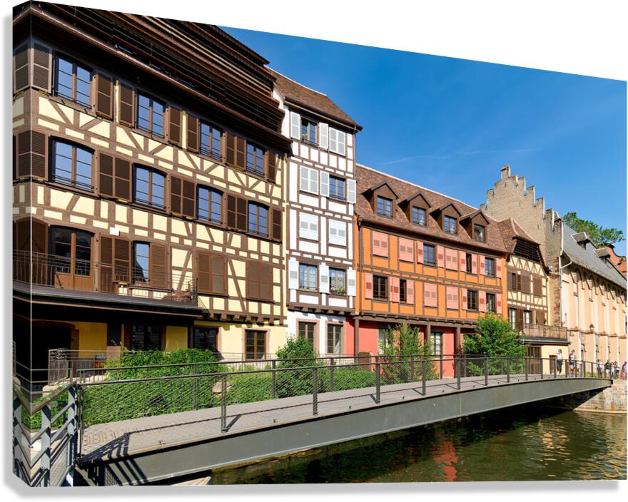 Visitors enjoy Petit France in Strasbourg with timber framed hou